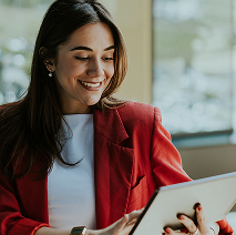 a woman holding a laptop